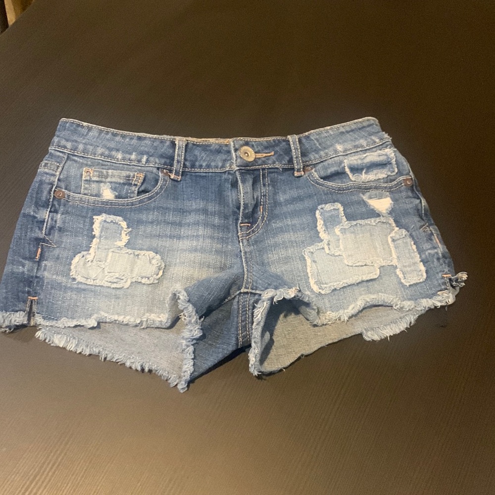 Jean shorts with cute patch designs on the front